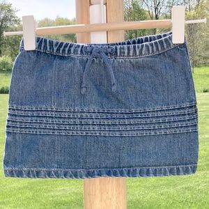 Old Navy: Girls 2T denim skirt w/5 horizontal tucks circling the middle.